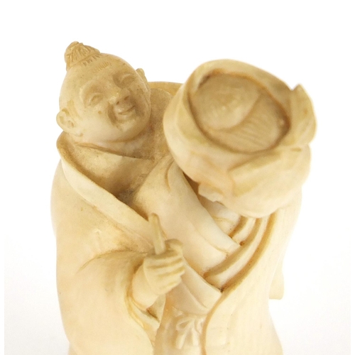 326 - Japanese carved ivory Okimono of a mother and child, 8cm high