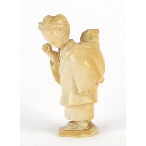 326 - Japanese carved ivory Okimono of a mother and child, 8cm high