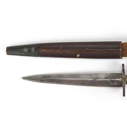 168 - Fairbairn and Sykes fighting knife by Wilkinson, with leather sheath, 28cm in length
