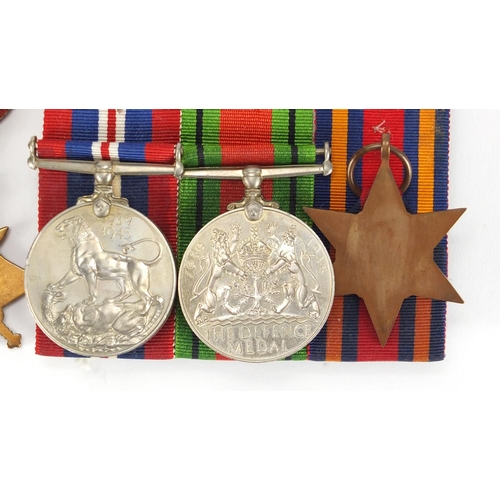 135 - British Military World War I and World War II medal group and a silver medallion including a trio aw... 