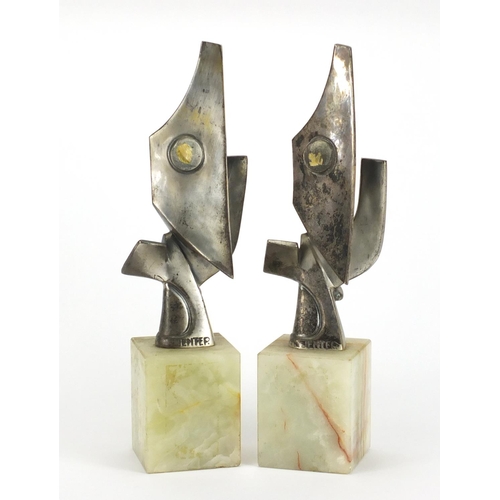 495 - Pair of Art Deco modernist silvered sculptures by Jenter, raised on a square onyx block bases, 39.5c... 
