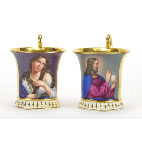 402 - Good Pair of 19th century continental porcelain cabinet cups and saucers, hand painted with Madonna ... 