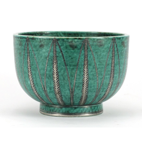 486 - Swedish art pottery bowl by Gustavsberg with silver inlay, decorated with stylised leaves, factory m... 