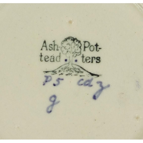 468 - Two Ashtead pottery plates including one hand painted with a duck, each with factory marks to the re... 