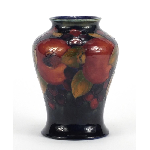 455 - Moorcroft baluster vase hand painted and tube lined in the pomegranate pattern, impressed marks and ... 