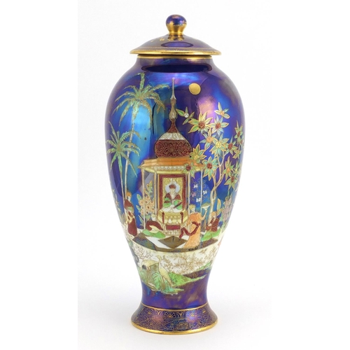 462 - Carlton Ware baluster vase and cover hand painted and gilded in the Persian pattern, factory marks a... 