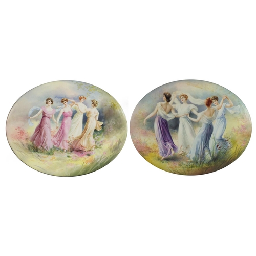 443 - Two Royal Doulton oval porcelain plaques each decorated with four maidens in a landscape, each mount... 