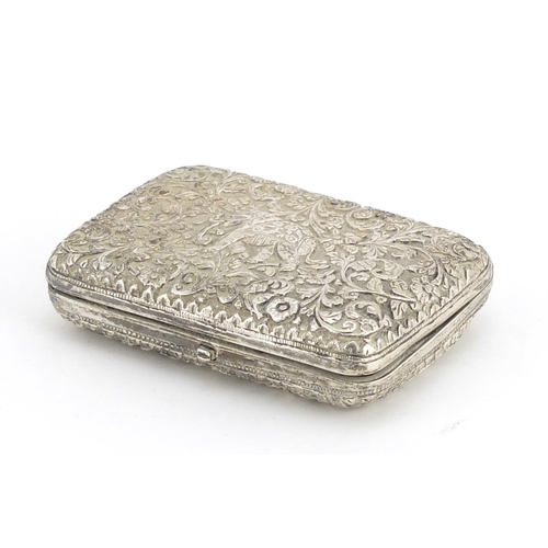 373 - Indian unmarked silver cigarette case, embossed with and elephant and warthog amongst flowers, 9cm w... 