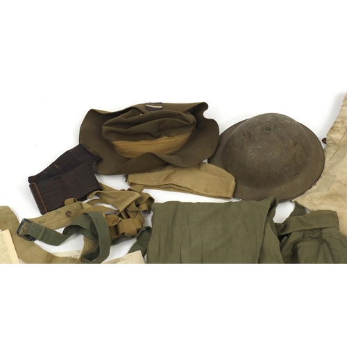 150 - Military interest Burmese uniform including caps relating to CPL CJJ Emkins
