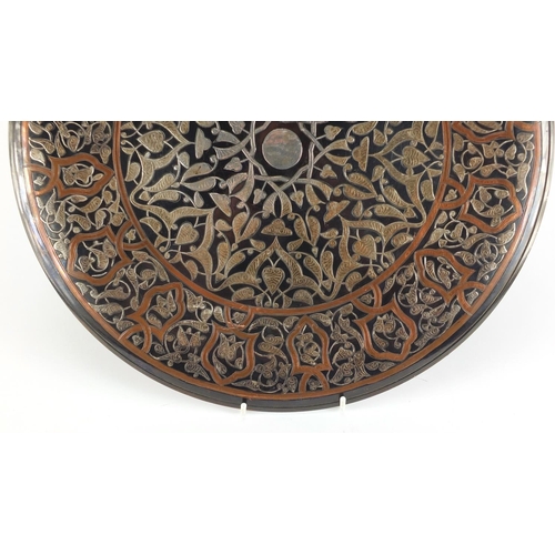 354 - Egyptian Cairo Ware copper wall charger with silver foliate inlay, 40.5cm in diameter
