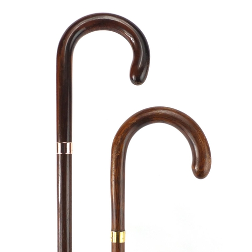 88 - Two walking sticks, one with 9ct gold collar the other with 18ct gold plated collar, the largest 87c... 