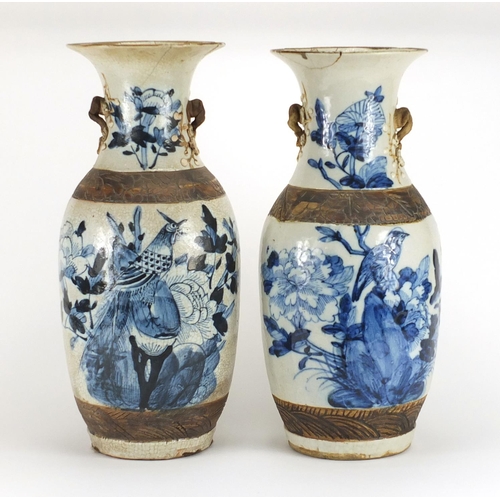 243 - Pair of Chinese blue and white crackle glazed baluster vases with twin handles, hand painted with bi... 