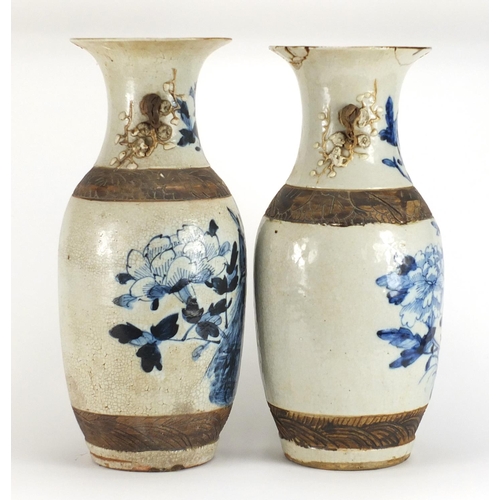 243 - Pair of Chinese blue and white crackle glazed baluster vases with twin handles, hand painted with bi... 