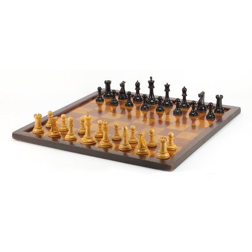103 - Staunton chess set by Jaques & Son with mahogany boxwood chess board, the largest chess piece 9cm hi... 