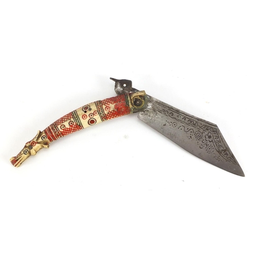 361 - Continental folding knife with carved bone handle and steel blade, 23cm in length