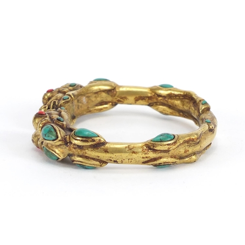 358 - Tibetan gilt metal dragon bangle set with turquoise and coral, 8cm wide