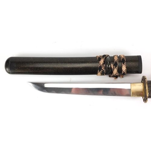 331 - Japanese short wakizashi with scabbard and steel blade, having a visible hamon, 42cm in length