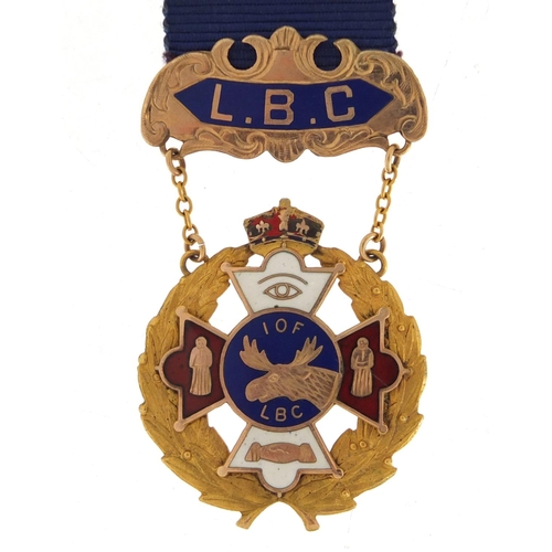 129 - 10ct gold and enamel Independent Order of the Foresters jewel, approximate weight 13.0g