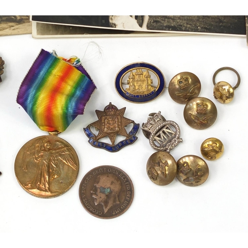 143 - Predominantly British Militaria including First World War victory medal, awarded to T-206610PTE.S.J.... 