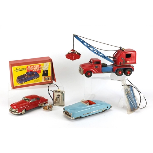 105 - Vintage toys including a Schuco electric car with box, numbered 5380U, German tinplate clockwork car... 