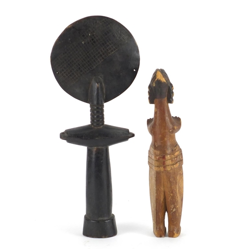 339 - Two tribal wood carvings including an Akuaba fertility doll, the largest 39cm high