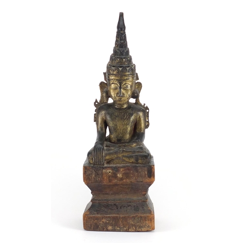 332 - 17th/18th century Burmese lacquered wood carving of Buddha, with remnants of gilding and inscribed p... 
