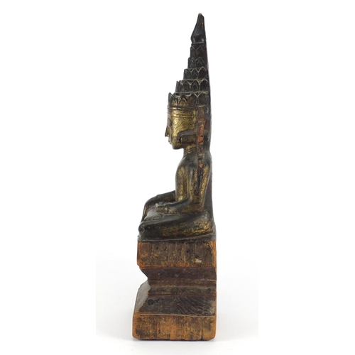332 - 17th/18th century Burmese lacquered wood carving of Buddha, with remnants of gilding and inscribed p... 