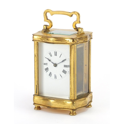 721 - French gilt brass carriage clock, with enamelled dial and Roman numerals, 12cm high