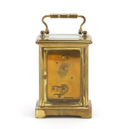 722 - French brass cased carriage clock with travelling case, the clock with enamelled dial and Roman nume... 