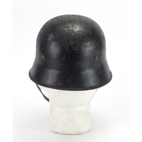 159 - German Military interest fire police double decal helmet, with leather liner