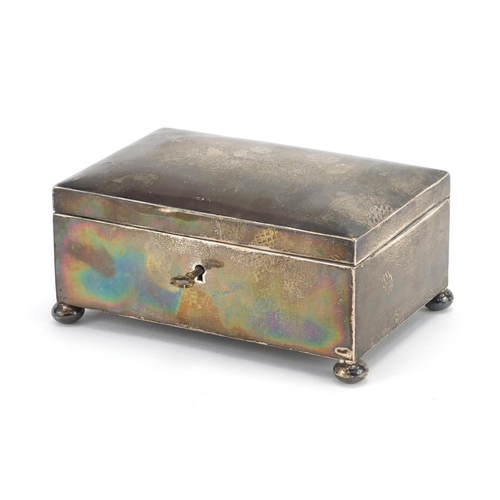 531 - Rectangular silver lockable casket with ball feet and silk lined interior, by Walker & Hall, 15.5cm ... 