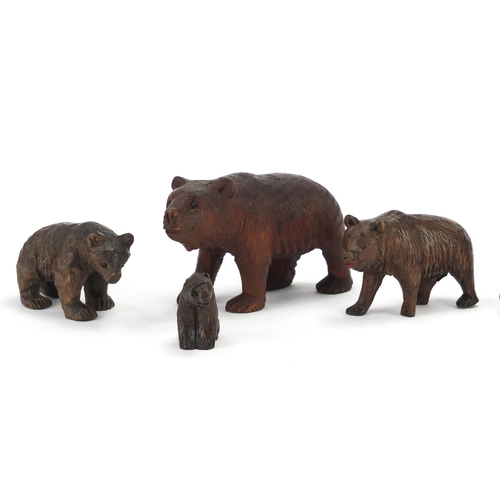 17 - Eight carved Black Forest bears, the largest 9.5cm in length