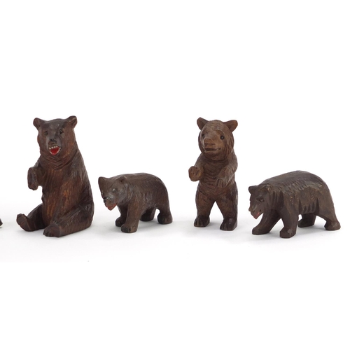 17 - Eight carved Black Forest bears, the largest 9.5cm in length