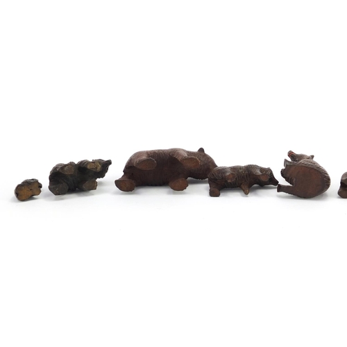 17 - Eight carved Black Forest bears, the largest 9.5cm in length