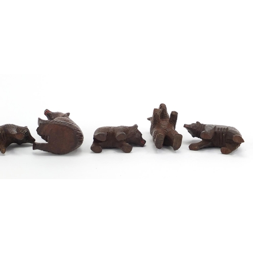 17 - Eight carved Black Forest bears, the largest 9.5cm in length