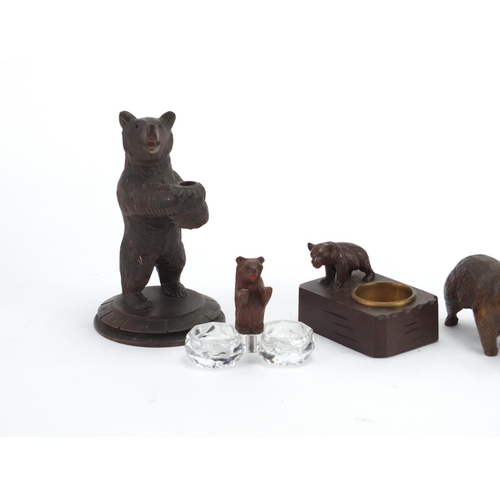 16 - Five carved Black Fores bears including an ashtray and salt, the largest 13.5cm high