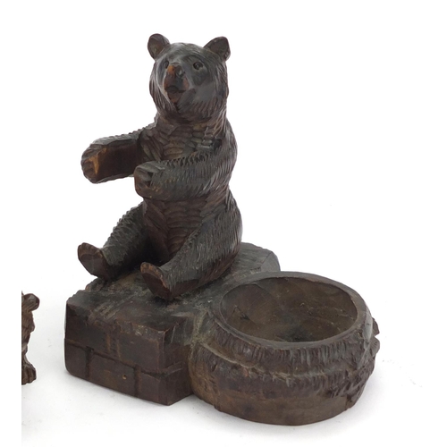 15 - Three carved Back Forest bears including two dishes, the largest 13cm high