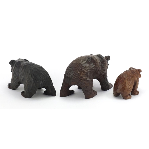14 - Three carved Black Forest bears, the largest 20cm in length