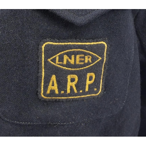 151 - British Military World War II London North Eastern Railway ARP jacket with badges, property of LNER ... 