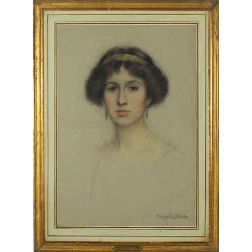 891 - Bradford Johnson - Portrait of a young female, late Victorian pastel and charcoal, label verso, moun... 