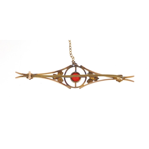 604 - Art Nouveau 9ct gold seed pearl and garnet bar brooch, 6.5cm in length, approximate weight 3.9g, hou... 