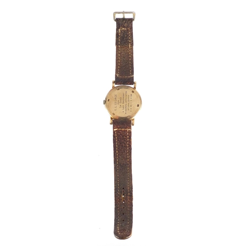 676 - Gentleman's 9ct gold Garrard wristwatch, 3.4cm in diameter