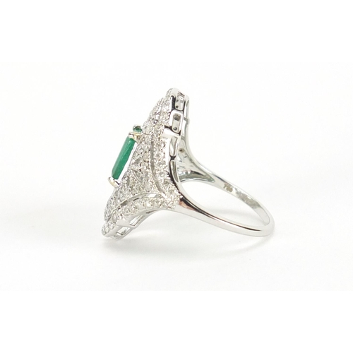 589 - 18ct white gold emerald and diamond ring, size J, approximate weight 4.3g