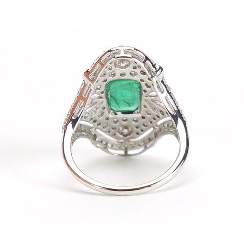 589 - 18ct white gold emerald and diamond ring, size J, approximate weight 4.3g