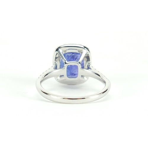 611 - 18ct white gold tanzanite and diamond ring, size N, approximate weight 4.6g
