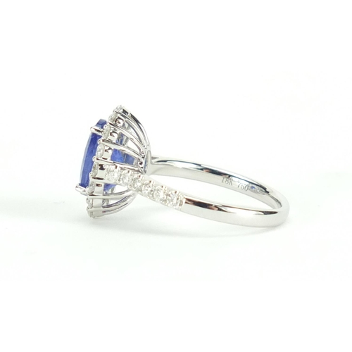 632 - 18ct white gold tanzanite and diamond ring, size N, approximate weight 4.7g