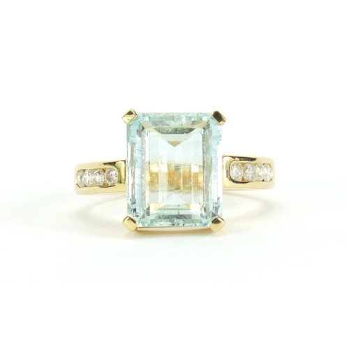 623 - 18ct gold aquamarine ring with diamond shoulders, size R, approximate weight 6.6g