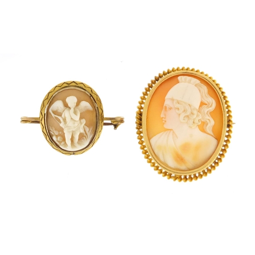621 - Two cameo brooches with gold mounts including cupid, the largest 3.5cm in length, approximate weight... 