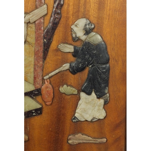 330B - Pair of Chinese hardwood and soapstone panels, each depicting figures, each with Yai Loong labels ve... 