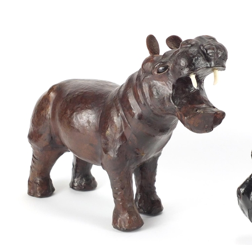 2423 - Three leather bound animals including two hippopotamus's